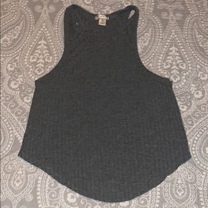 grey tank top.